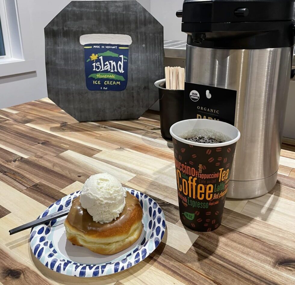 Maple frosted donut with maple ice cream and a fresh cup of coffee